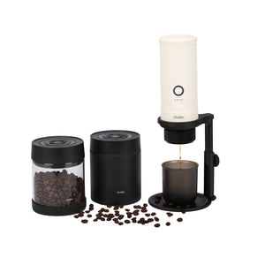 Outin Portable Espresso Machine brewing coffee, coffee beans, vacuum canister