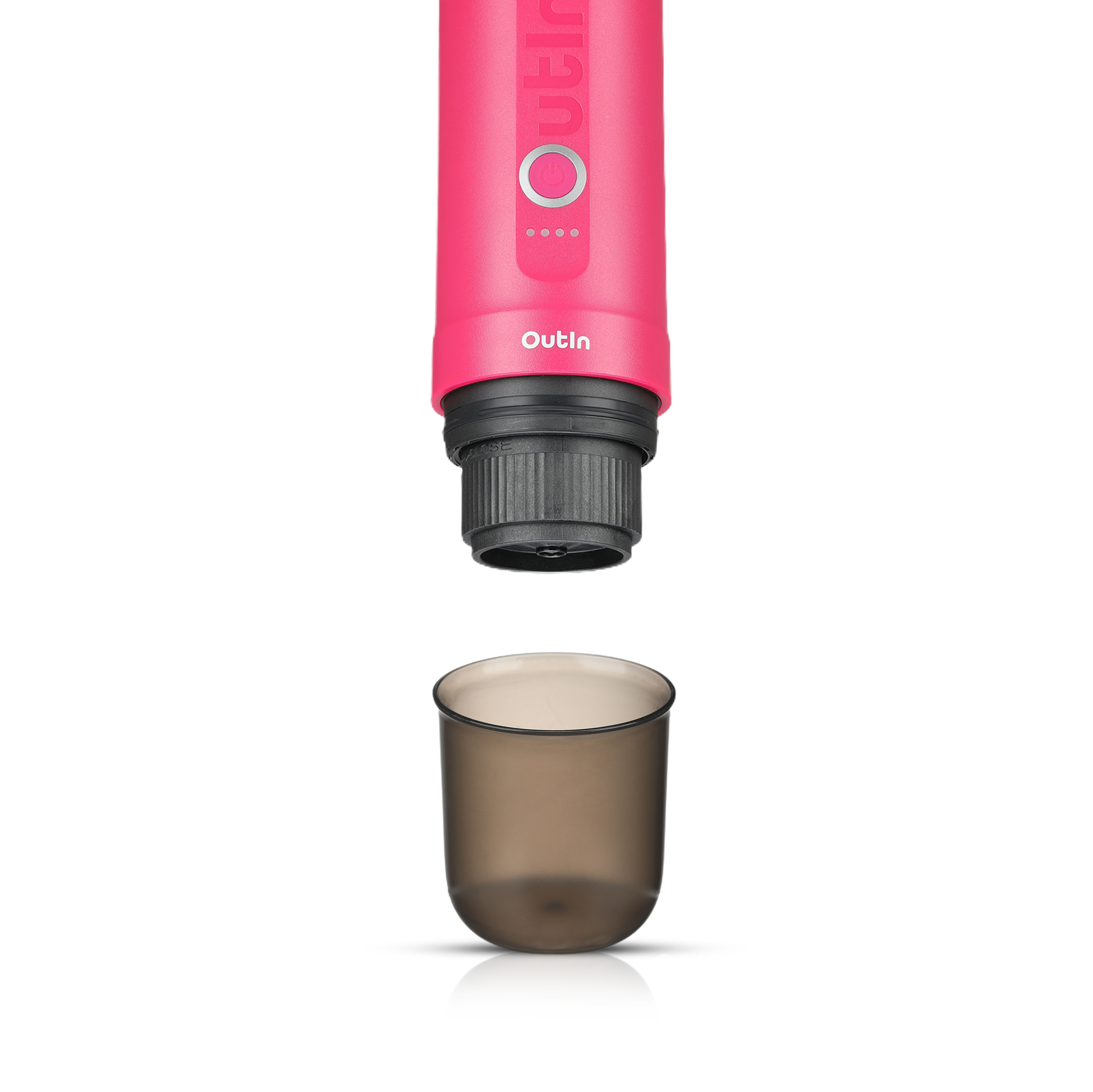 Fuchsia Pink Nano Portable Espresso Machine above a dark-tinted cup.