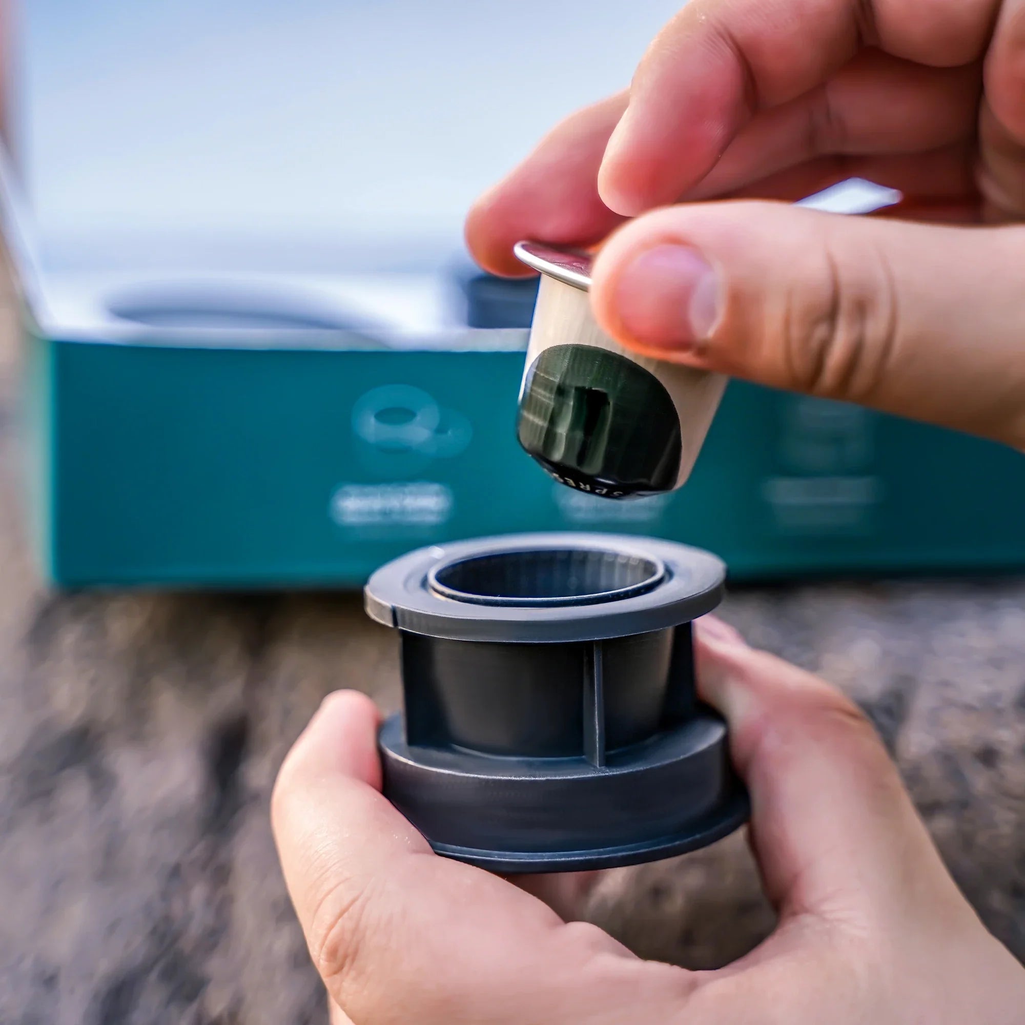 User demonstrating Capsule Adapter installation for Outin Nano portable espresso machine